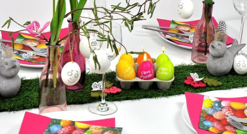 Pfiffiger Ostertisch mit Grastischband, lustigen Eiern und Ostereierkerzen im Eierkarton - Osterfrühstück mit Kindern
